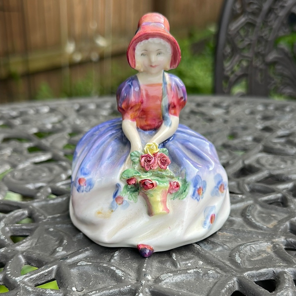 Hand-Painted Porcelain Lady Figurine in Pink and Purple